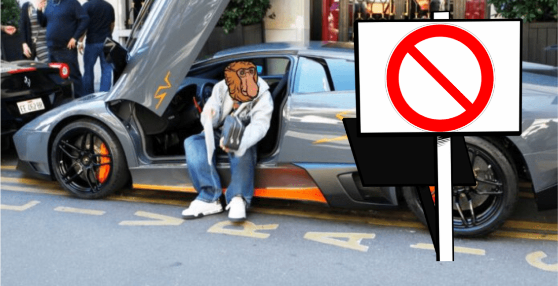 janusz siedzący w lamborghini, obok znak stop