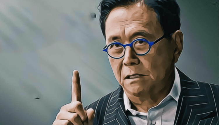 Kiyosaki z palcem wskazującym do góry