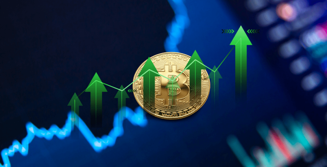 moneta bitcoin na tle wzrostowego wykresu