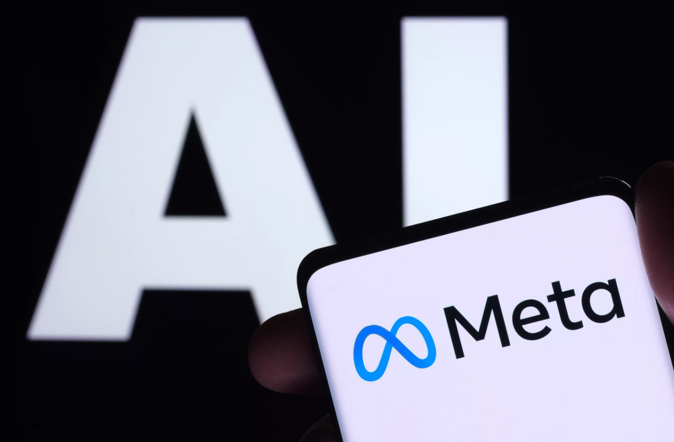 logo firmy Meta widoczne na telefonie z napisem AI w tle