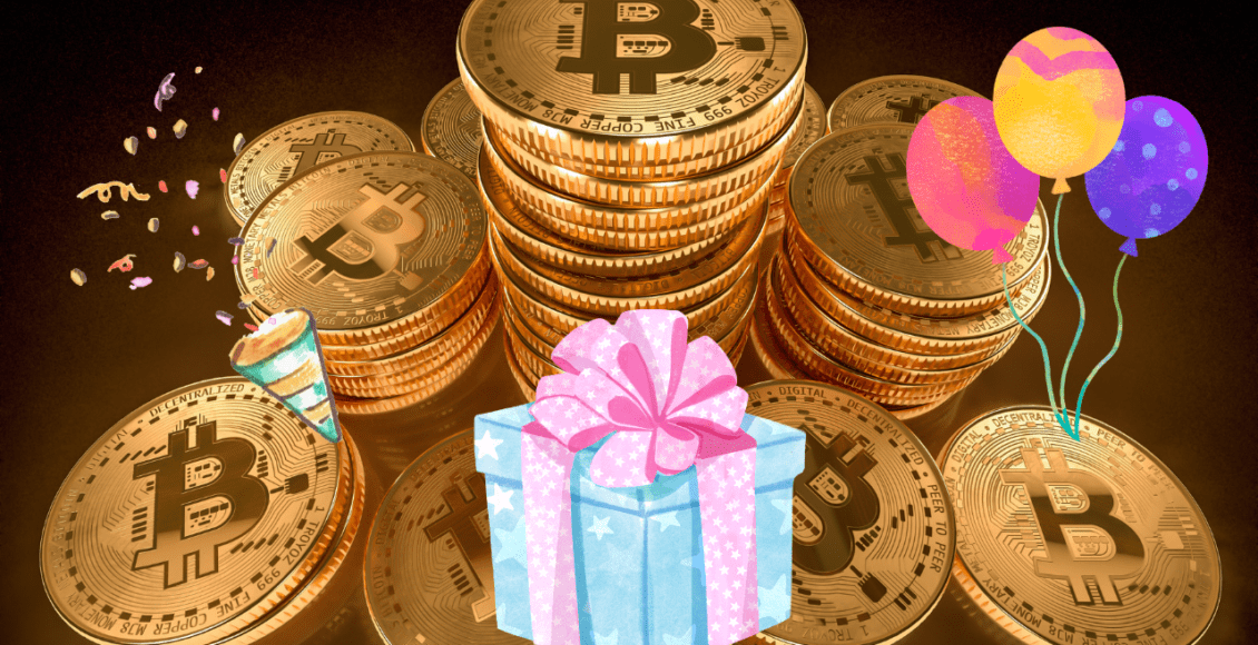 Monety Bitcoin z prezentami, girlandami i balonikami