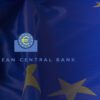flaga unii europejskiej, n a niej logo europejskiego banku centralnego
