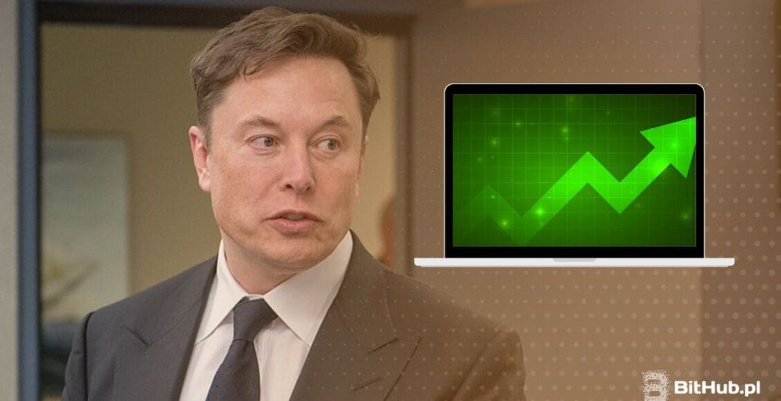 Elon Musk w garniturze, obok niego laptop z wykresem zielonym pnącym się ku górze
