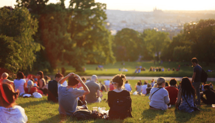 Millennials sitting in the sun