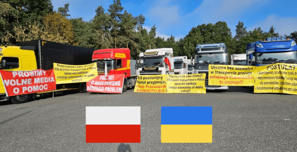 protest truckerów na granicy z ukrainą, na asfalcie polska i ukraińska flaga