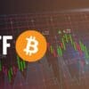 grafika przedstawiająca wykres i bitcoin ETF