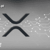 Szara grafika z kryptowalutą XRP