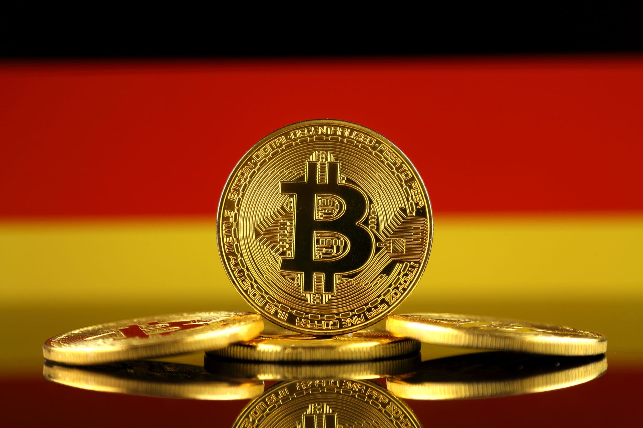 Bitcoin na tle flagi Niemiec