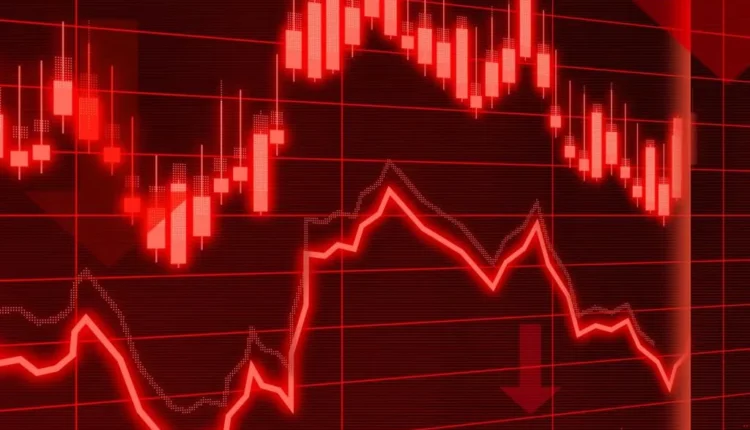 Spadkowy wykres notowań z czerwonymi strzałkami w dół