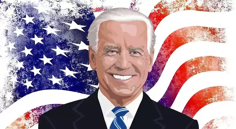 Joe Biden. W tle flaga USA.