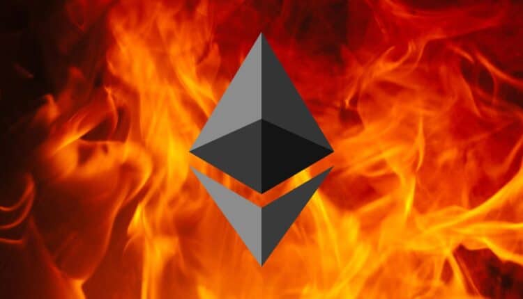 Pożar na tle którego wisi logo kryptowaluty Ethereum
