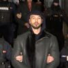 Andrew Tate w rękach policjantów
