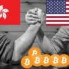 Siłowanie na rękę między USA i Hongkongiem. W tle logo Bitcoina.