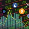 Kryptowaluty, w tyle wykresy giełdowe.