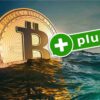 Moneta BTC w morzu
