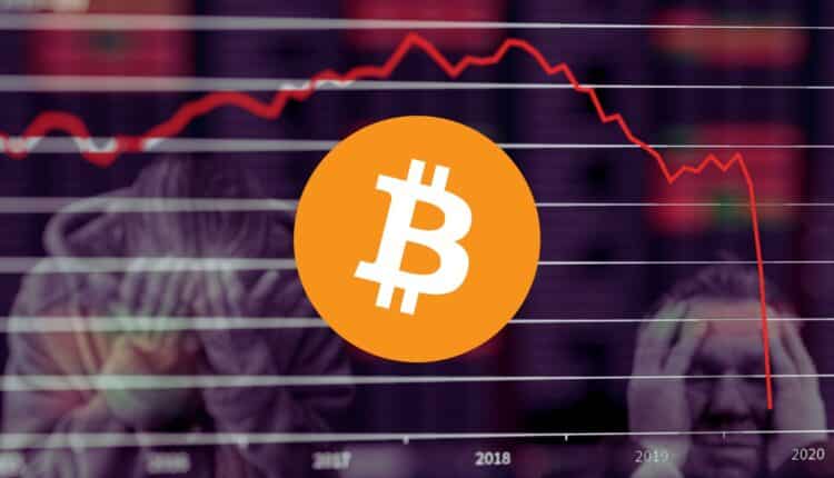 Bitcoin na tle wykresu, który pokazuje krach.