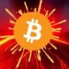 Bitcoin na tle rozgrzanego wulkanu.