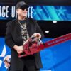 Elon Musk with chainsaw