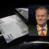 Portfel z banknotem o nominale 500 zł, w tle uśmiechnięty premier Donald Tusk.