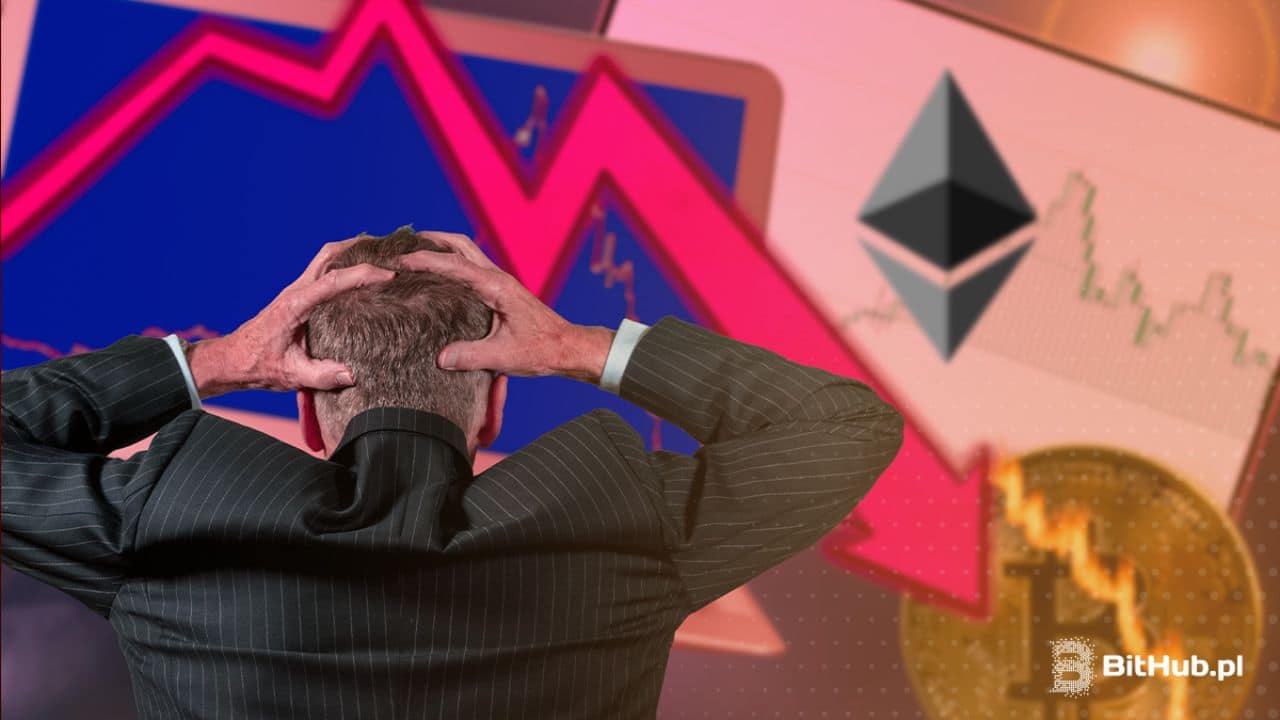 Bitcoin i Ethereum wykres spada poza ekran. Człowiek w garniturze chwyta się za głowę.