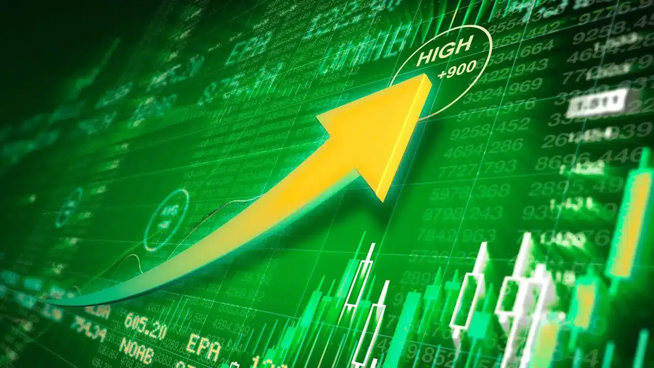 Zielony wykres z żółtą strzałką, która pokazuje wzrost.