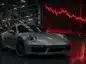 Porsche w kryzysie. W tle czerwony wykres pokazujący spadek.