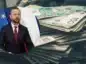 Władysław Kosiniak-Kamysz na tle banknotów.