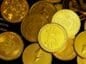 Stos krypowalut na stole - Ethereum, NEAR, Shiba
