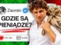 Rafał Zaorski trzyma worek pełen dolarów