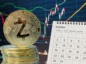 Zcash obok kalendarza na tle wykresów giełdowych.